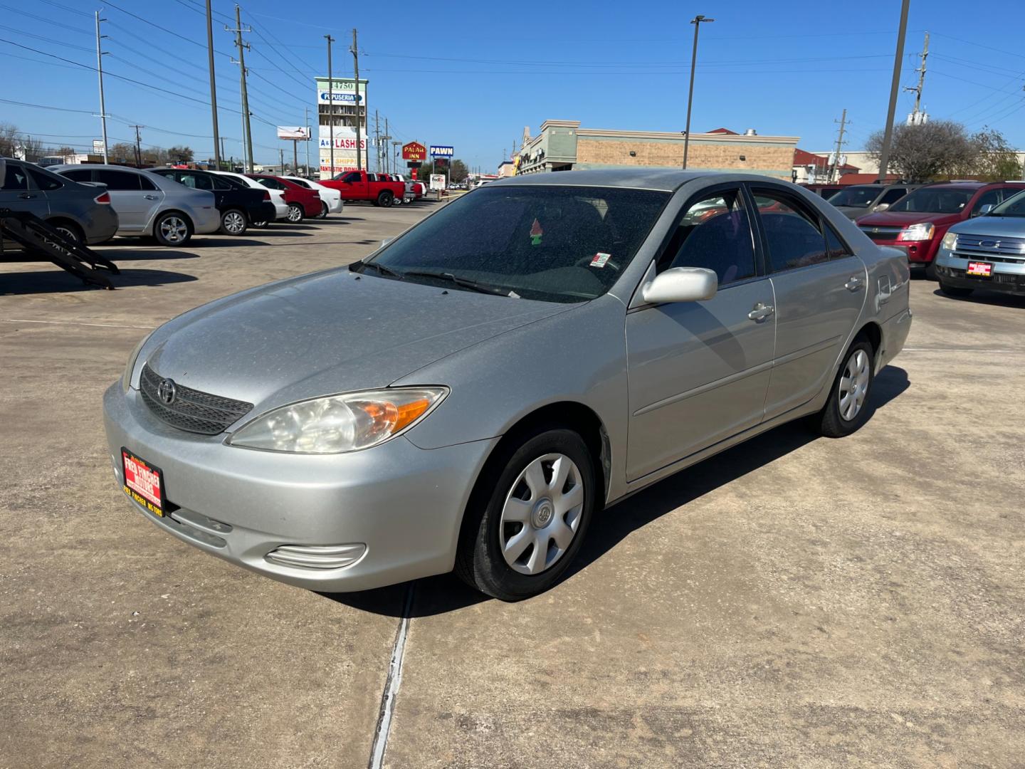 2002 SILVER /gray Toyota Camry LE (4T1BE32K72U) with an 2.4L L4 DOHC 16V engine, Automatic transmission, located at 14700 Tomball Parkway 249, Houston, TX, 77086, (281) 444-2200, 29.928619, -95.504074 - Photo#2